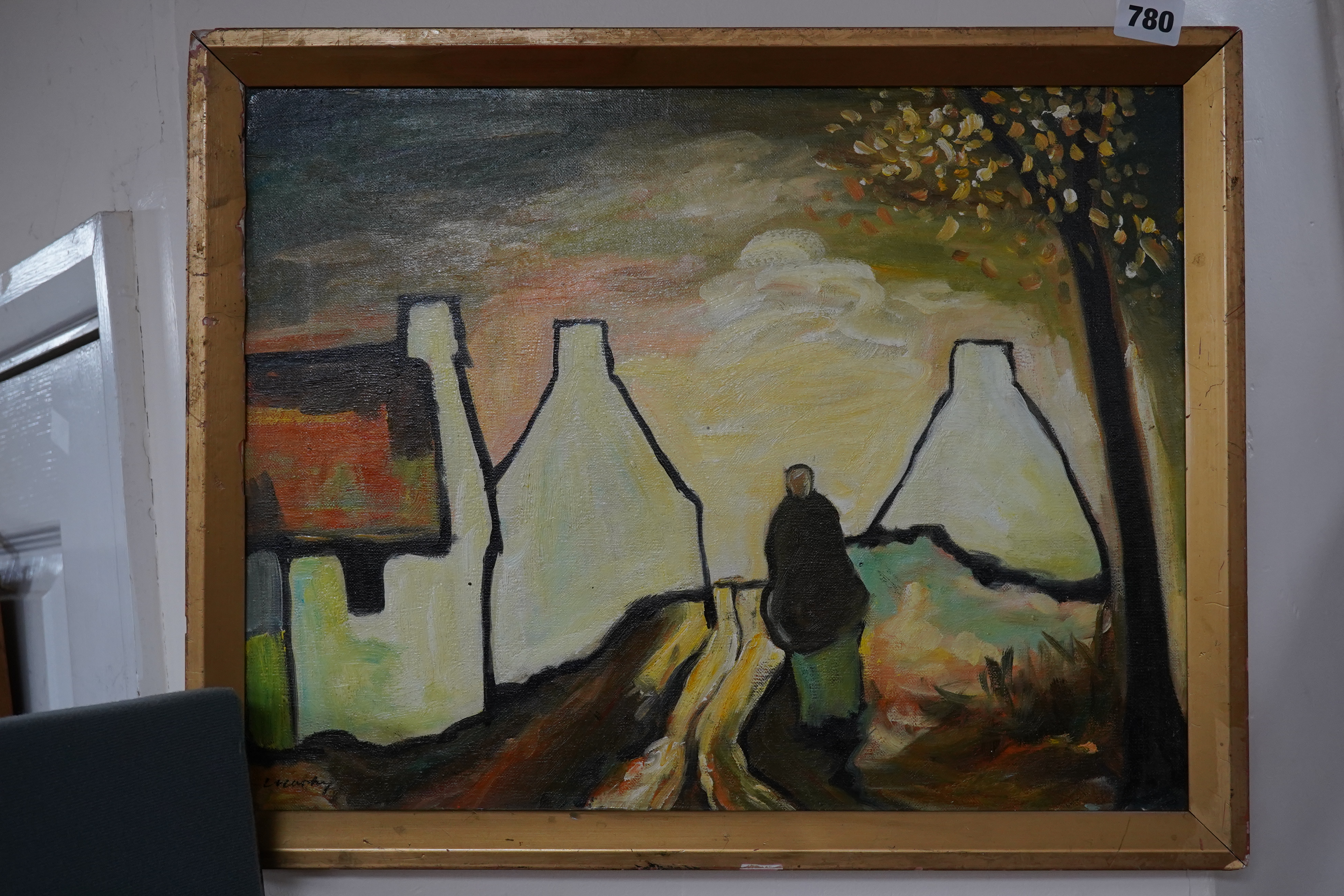 A decorative Irish oil on board, figures before cottages, 34 x 44cm. Condition - good